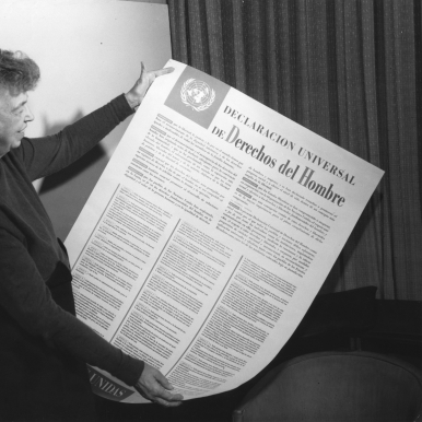Eleanor Roosevelt holds a Spanish language version of the Universal Declaration of Human Rights